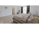 Main bedroom with large bed and window at 10125 Caprock Canyon Dr, Indianapolis, IN 46229