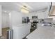 Modern kitchen featuring stainless steel appliances and white cabinetry at 10125 Caprock Canyon Dr, Indianapolis, IN 46229