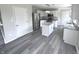 Modern kitchen with stainless steel appliances and granite countertops at 6558 Caressa Way, Indianapolis, IN 46259