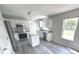 Bright kitchen featuring granite countertops and stainless steel appliances at 6558 Caressa Way, Indianapolis, IN 46259