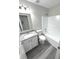 Clean bathroom featuring granite countertop, white vanity, and tub shower combo at 6558 Caressa Way, Indianapolis, IN 46259