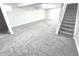 Spacious finished basement with gray carpeting and ample living space at 6558 Caressa Way, Indianapolis, IN 46259