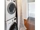 Stackable washer and dryer in unit with hardwood floors at 3965 N Meridian St # 3B, Indianapolis, IN 46208