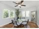 Dining area with glass table and four chairs at 307 Berkley Rd, Indianapolis, IN 46208