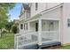 Charming house exterior with a front porch and ramp at 248 N Walcott N St, Indianapolis, IN 46201