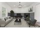 Virtually staged living room with fireplace and modern furniture at 248 N Walcott N St, Indianapolis, IN 46201