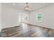 Spacious dining room with hardwood floors and multiple windows at 248 N Walcott N St, Indianapolis, IN 46201