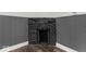 Stone fireplace adds warmth and character to the room at 248 N Walcott N St, Indianapolis, IN 46201