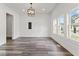 Bright dining room with hardwood floors and natural light at 248 N Walcott N St, Indianapolis, IN 46201