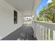 Long front porch offering a relaxing outdoor space at 248 N Walcott N St, Indianapolis, IN 46201