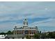 Exterior view of a historic courthouse and surrounding buildings at 150 S Main St # 404, Franklin, IN 46131