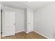 Simple bedroom with two closets and wood flooring at 3649 N Sadlier Dr, Indianapolis, IN 46226