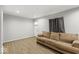 Cozy living room with a neutral color scheme and wood floors at 3649 N Sadlier Dr, Indianapolis, IN 46226