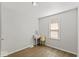 Empty bedroom with vanity and window at 3649 N Sadlier Dr, Indianapolis, IN 46226