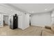 Spacious living room with hardwood floors and kitchen access at 3649 N Sadlier Dr, Indianapolis, IN 46226