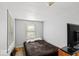Cozy bedroom with double bed and window at 3649 N Sadlier Dr, Indianapolis, IN 46226