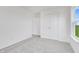 Light and airy bedroom with gray carpeting and double doors at 7237 Glen Park Way, Indianapolis, IN 46259