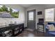 Bright living room with comfy blue sofa and large TV at 17128 Towne Rd, Westfield, IN 46074