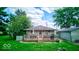 Backyard view with deck, grill, and patio furniture at 17128 Towne Rd, Westfield, IN 46074