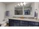 Bathroom with double vanity, granite countertop and walk-in shower at 17128 Towne Rd, Westfield, IN 46074