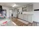 Updated kitchen with gray cabinets, granite counters, and stainless steel appliances at 17128 Towne Rd, Westfield, IN 46074