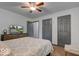 Bedroom with queen bed, TV, and additional closet space at 17128 Towne Rd, Westfield, IN 46074