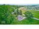 Aerial view of house, detached garage, and large backyard with mature trees at 17128 Towne Rd, Westfield, IN 46074