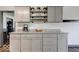 Modern kitchen island with granite countertop and gray cabinets at 17128 Towne Rd, Westfield, IN 46074