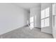 Spacious bedroom featuring grey carpet and natural light at 1050 Bevy Blvd, Danville, IN 46122