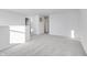 Ample bedroom with grey carpet and access to hallway at 1050 Bevy Blvd, Danville, IN 46122