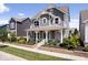 Two-story house with gray siding, white trim, and a front porch at 15551 Heatherbank Dr, Westfield, IN 46074