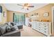 Bright bedroom with sectional sofa and built-ins at 6413 Mallard Dr, Nineveh, IN 46164