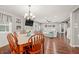 Dining room with wood table and chairs, and view to living room at 6413 Mallard Dr, Nineveh, IN 46164