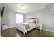 Cozy bedroom with a white bed frame and gray walls at 14826 Braemar E Ave, Noblesville, IN 46062