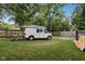 Backyard with a white van and small vehicles at 32 S Sheridan Ave, Indianapolis, IN 46219