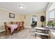 Spacious dining room with view into living room at 32 S Sheridan Ave, Indianapolis, IN 46219