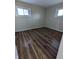 Spacious bedroom with neutral walls and vinyl flooring at 4809 N Kitley Ave, Indianapolis, IN 46226