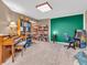 Finished basement office with built-in bookshelves and a game at 2249 South Lake E Ave, Greenwood, IN 46143