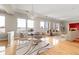Elegant dining room with hardwood floors, chandelier, and city views at 350 N Meridian St # 901, Indianapolis, IN 46204