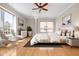 Spacious bedroom with hardwood floors and large windows at 350 N Meridian St # 901, Indianapolis, IN 46204