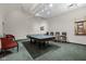 Game room with ping pong table, comfortable seating and pool cues at 350 N Meridian St # 901, Indianapolis, IN 46204