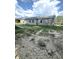 New construction home with a gray exterior and landscaping at 207 N Birchwood Dr, Muncie, IN 47304