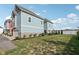 Large grassy side yard with a privacy fence at 9264 Hawley Dr, Indianapolis, IN 46216
