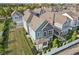 Aerial view showcasing a charming two-story home with a gray and blue exterior at 9264 Hawley Dr, Indianapolis, IN 46216
