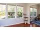 Sunroom with hardwood floors and multiple windows at 5213 Dunewood Way, Avon, IN 46123