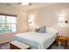 Bright main bedroom with large window and ensuite bathroom access at 5213 Dunewood Way, Avon, IN 46123
