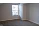 Spacious bedroom with window and neutral walls at 5213 Dunewood Way, Avon, IN 46123
