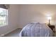 Bright bedroom with a double bed and large window at 5213 Dunewood Way, Avon, IN 46123