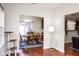 Open living area with hardwood floors and access to dining area at 5213 Dunewood Way, Avon, IN 46123