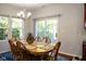 Bright dining room with hardwood floors and sliding glass doors at 5213 Dunewood Way, Avon, IN 46123